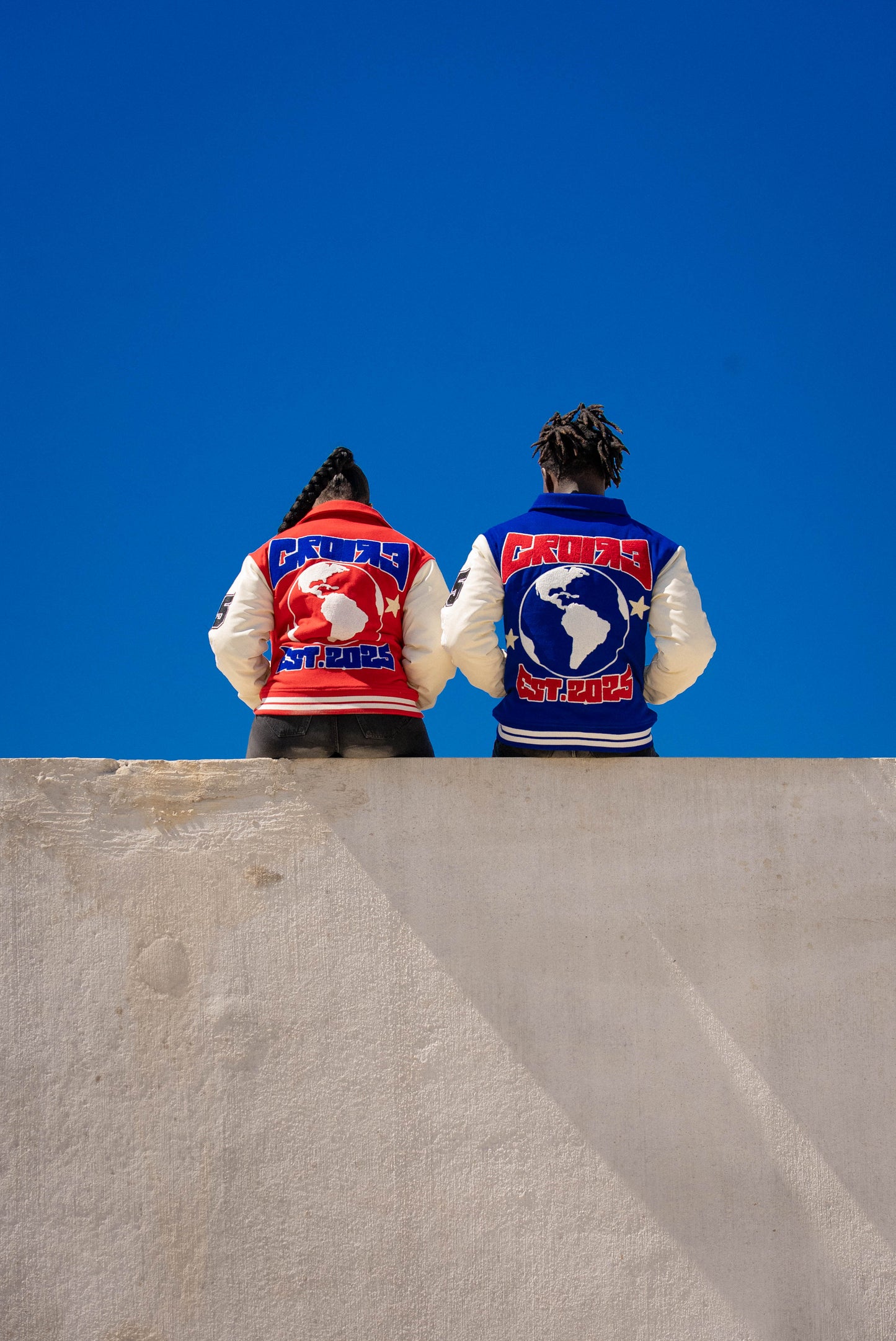 BLUE & RED ICON 25 VARSITY JACKET